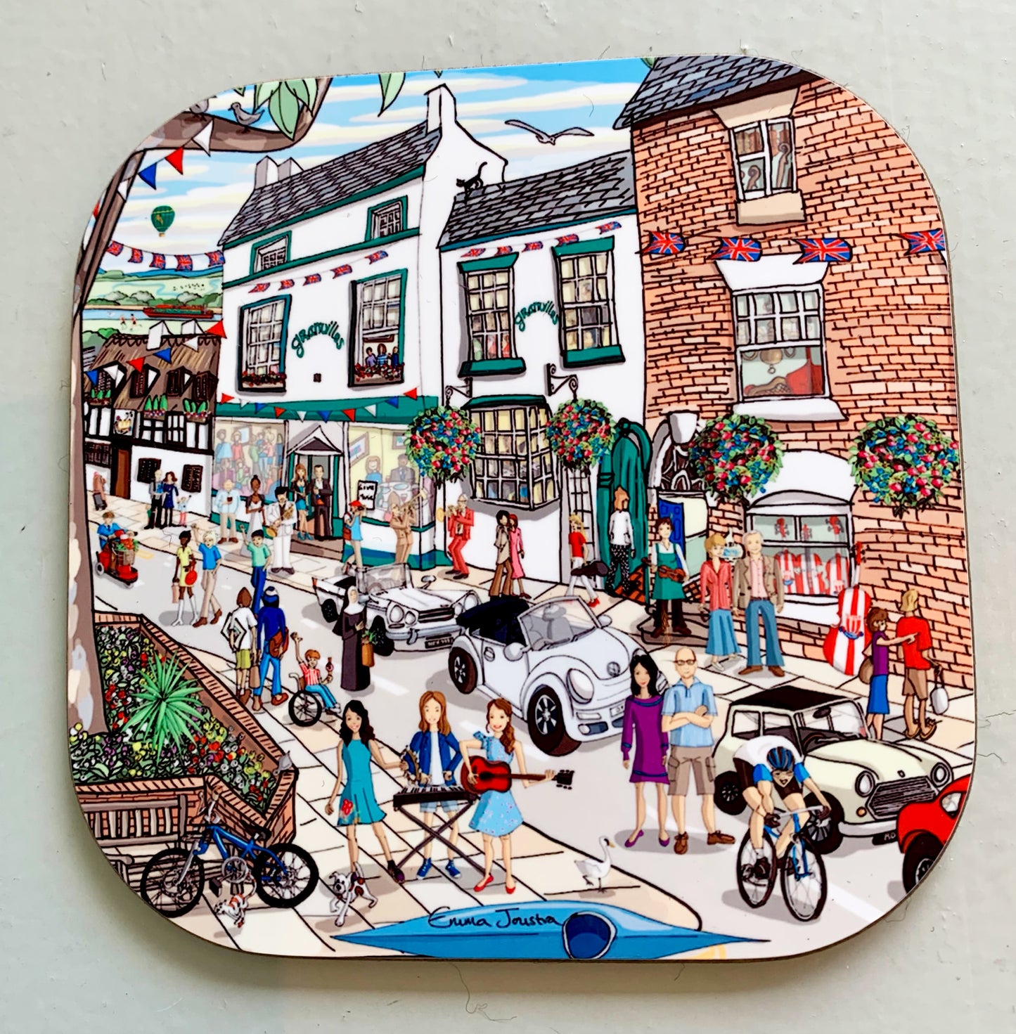 Cycling past Granville Square coaster